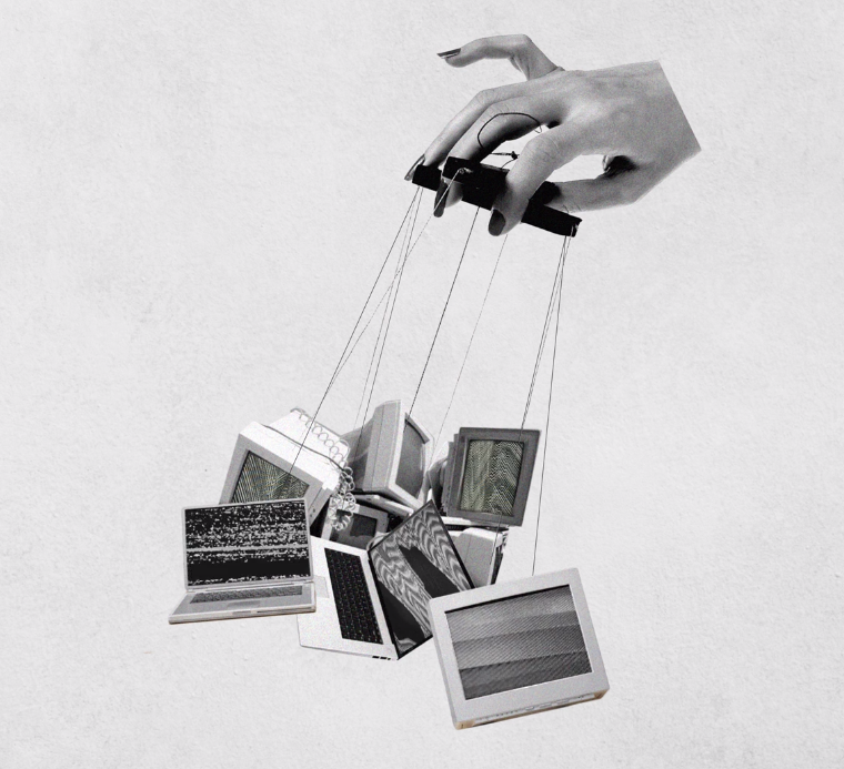 black and white colored image with hand puppeteering computers