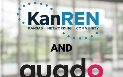 blurred inside of a building background with KanRen Q9 announcing partnership