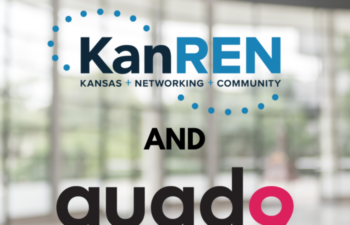 blurred inside of a building background with KanRen Q9 announcing partnership