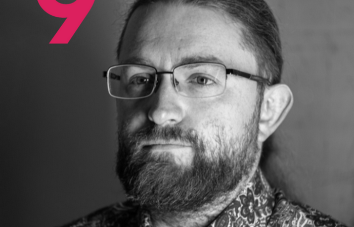 grey and black background with red 9, Michał "rysiek" Woźniak: quad9 Senior Operations Engineer
