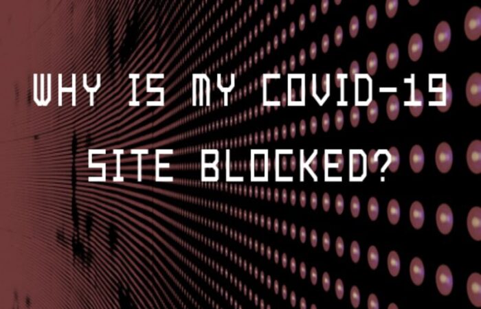 computer grid background featuring Why is my Covid-19 site blocked?