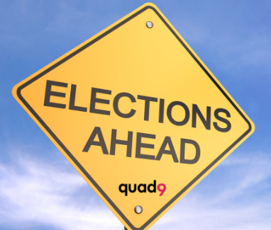 blue sky background quad9 yellow sign saying elections ahead