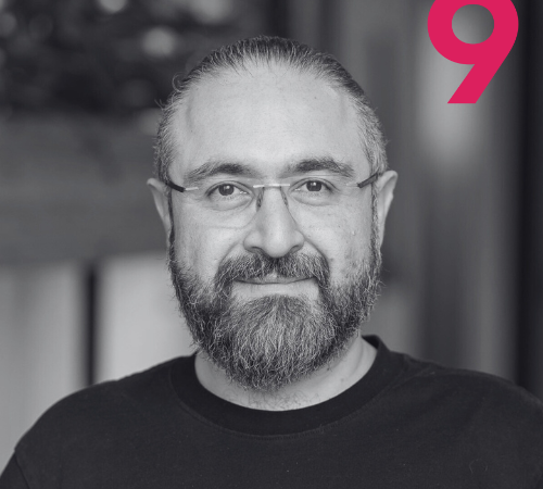 Staff Highlight of Babak Farrokhi with red 9: quad 9 Director of Operations