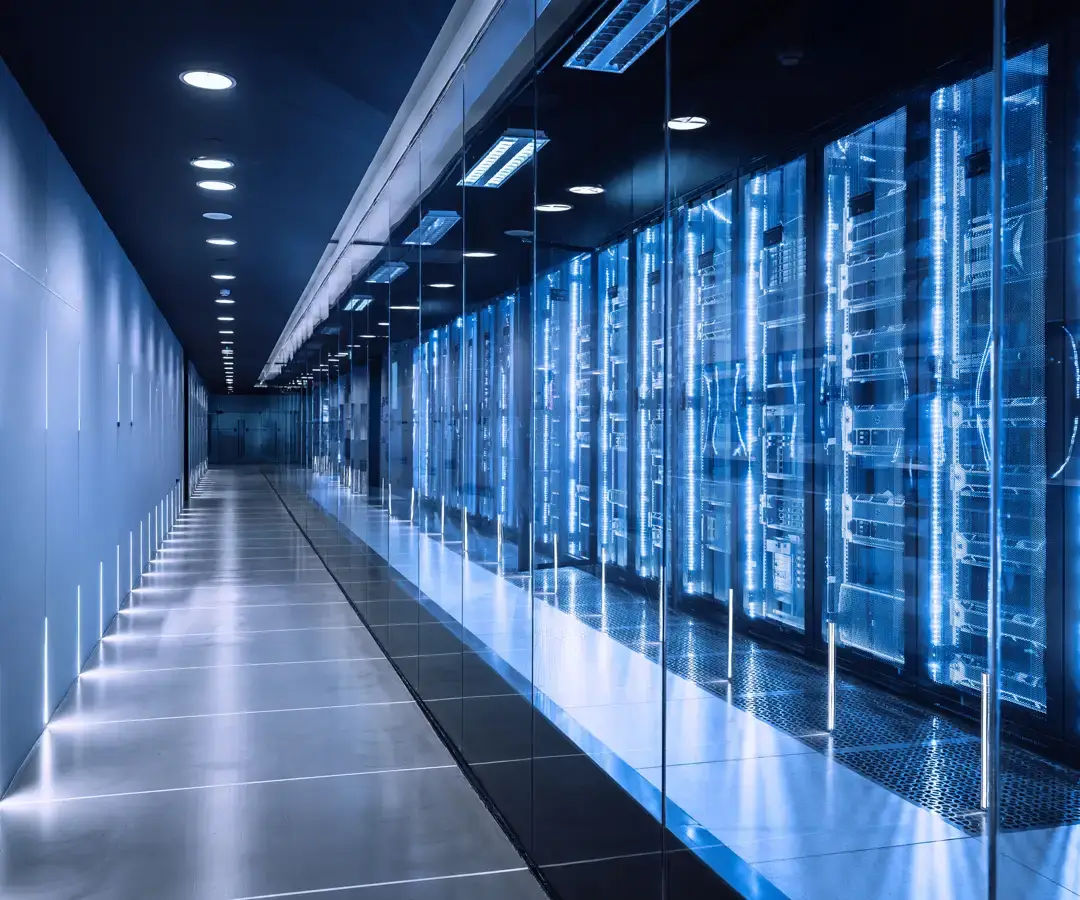 A horizontal, wide shot of a futuristic data center corridor with rows of server racks and control panels,